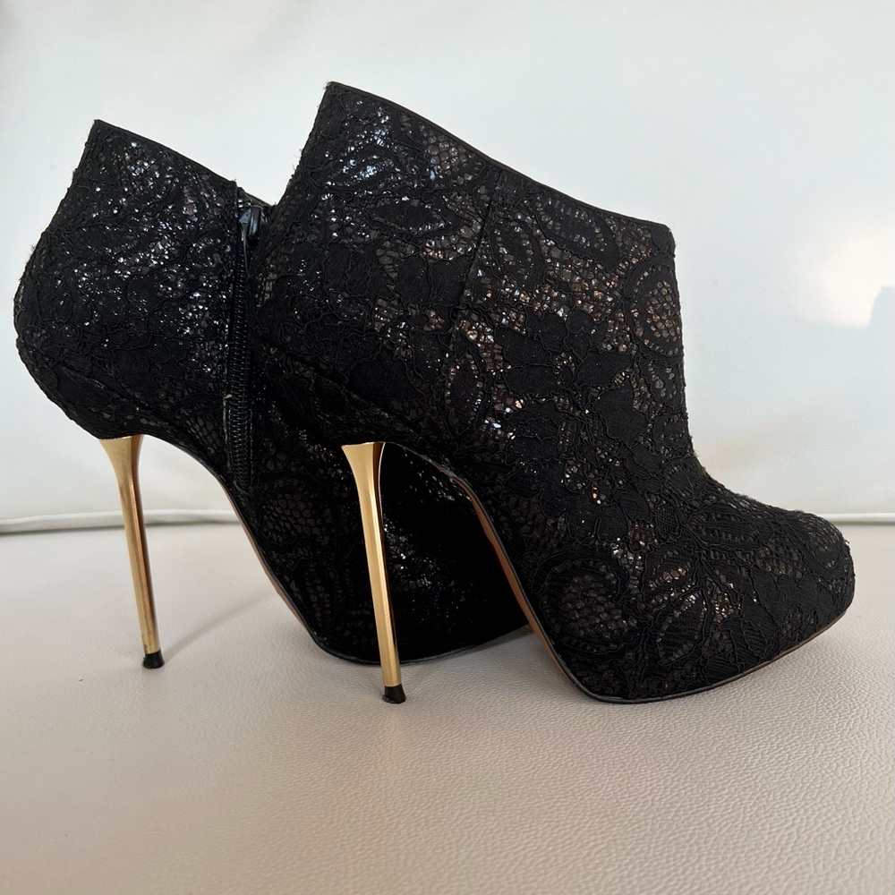 Wild Pair booties. Size . Leather with beautiful lace on top. W box.